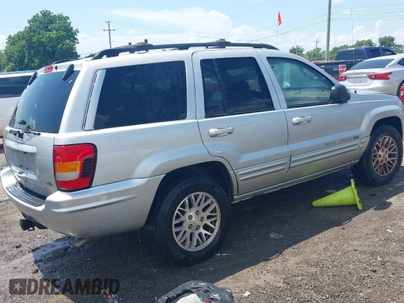 2004 Jeep Grand Cherokee Limited with VIN 1J4GW58N64C283657, listed as a IAAI auction lot 42542150 with 228,910 mi miles and . Bid and sale history available at DreamBid. Image 4.