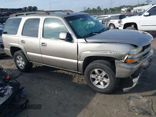 2003 Chevrolet Tahoe LS with VIN 1GNEK13Z13R257045, listed as a IAAI auction lot 41421367 with 306,991 mi miles. Bid and sale history available at carsss.com. Image 1.
