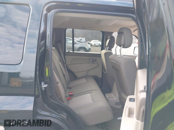 2012 Jeep Liberty Sport with VIN 1C4PJMAKXCW153053, listed as a IAAI auction lot 41728329 with 81,866 mi miles and . Bid and sale history available at DreamBid. Image 8.