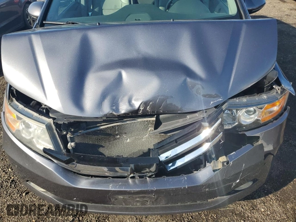 2014 Honda Odyssey Touring with VIN 5FNRL5H94EB116891, listed as a Copart auction lot 61400725 with 202,972 mi miles and Salvage title. Bid and sale history available at DreamBid. Image 12.