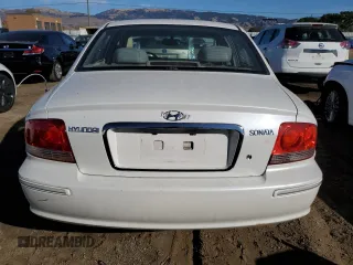 2004 Hyundai Sonata GLS with VIN KMHWF35HX4A975027, listed as a Copart auction lot 82652354 with 148,296 mi miles and Salvage Title. Bid and sale history available at carsss.com. Image 6.