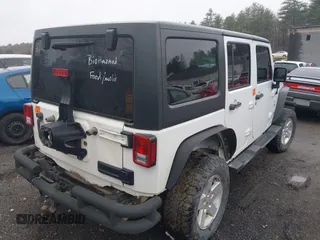 2014 Jeep Wrangler Unlimited Rubicon with VIN 1C4BJWFG9EL274851, listed as a IAAI auction lot 41946440 with 1 mi miles. Bid and sale history available at carsss.com. Image 4.