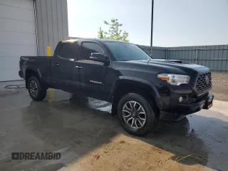 2022 Toyota Tacoma SR5 with VIN 3TYDZ5BN5NT013509, listed as a Copart auction lot 63307255 with 34,039 mi miles and Salvage title. Bid and sale history available at DreamBid. Image 4.