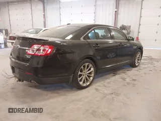 2014 Ford Taurus Limited z VIN 1FAHP2J88EG112614, wystawiony jako IAAI lot #42135220 z przebiegiem 70 409 mil mil oraz . Historia ofert i sprzedaży dostępna na DreamBid. Obrazek 4.