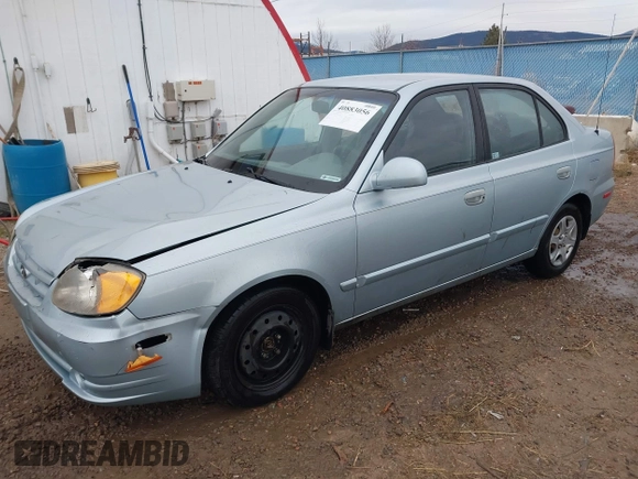2003 Hyundai Accent GL z VIN KMHCG45C43U465523, wystawiony jako IAAI lot #40883056 z przebiegiem 95 770 mil mil oraz . Historia ofert i sprzedaży dostępna na DreamBid. Obrazek 2.