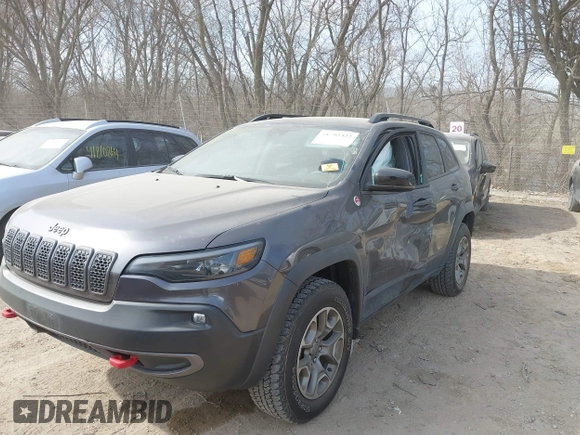 2022 Jeep Cherokee Trailhawk with VIN 1C4PJMBX4ND536592, listed as a IAAI auction lot 41792322 with 43,611 mi miles and . Bid and sale history available at DreamBid. Image 6.