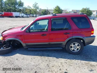 2004 Ford Escape XLT with VIN 1FMCU931X4KB19738, listed as a IAAI auction lot 41925561 with 220,674 mi miles. Bid and sale history available at carsss.com. Image 14.