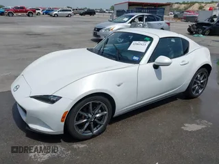 2023 Mazda MX-5 Miata Grand Touring с VIN JM1NDAM71P0560062, выставлен на аукционе IAAI как лот 42065123 с пробегом 11 320 миль миль и . История ставок и продаж доступна на DreamBid. Изображение 2.