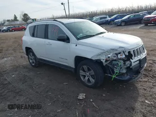 2011 Jeep Compass Latitude with VIN 1J4NF1FBXBD239337, listed as a IAAI auction lot 41474999 with 150,714 mi miles. Bid and sale history available at carsss.com. Image 1.