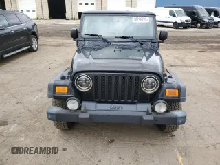 2003 Jeep Wrangler Sport z VIN 1J4FA49S13P374688, wystawiony jako Copart lot #58296735 z przebiegiem 184 554 mil mil oraz Czysty tytuł • Clean title. Historia ofert i sprzedaży dostępna na DreamBid. Obrazek 5.