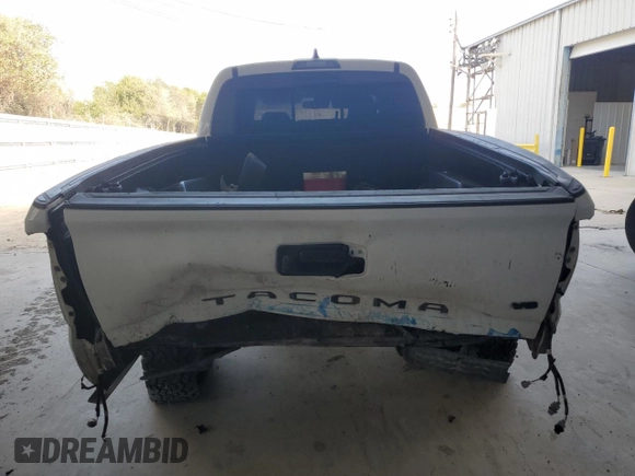 2021 Toyota Tacoma SR5 z VIN 3TMBZ5DN6MM031399, wystawiony jako Copart lot #82078704 z przebiegiem 139 358 mil mil oraz Czysty tytuł • Clean title. Historia ofert i sprzedaży dostępna na DreamBid. Obrazek 6.