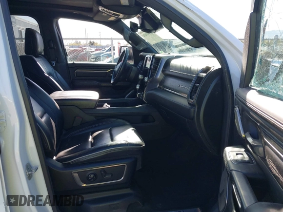 2021 Ram 1500 Limited with VIN 1C6SRFHT0MN626891, listed as a IAAI auction lot 41999414 with 38,931 mi miles and . Bid and sale history available at DreamBid. Image 5.
