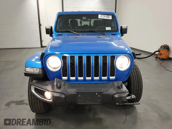 2023 Jeep Gladiator Overland z VIN 1C6HJTFG6PL564337, wystawiony jako Copart lot #59620315 z przebiegiem 31 552 mil mil oraz Czysty tytuł • Clean title. Historia ofert i sprzedaży dostępna na DreamBid. Obrazek 5.