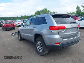 2014 Jeep Grand Cherokee Limited with VIN 1C4RJFBGXEC517832, listed as a IAAI auction lot 42583697 with 107,719 mi miles and . Bid and sale history available at DreamBid. Image 3.