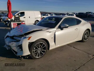 2020 Toyota 86 with VIN JF1ZNAA10L8751343, listed as a Copart auction lot 88573335 with 79,864 mi miles and Salvage Title. Bid and sale history available at carsss.com. Image 1.
