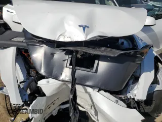 2024 Tesla Model Y Long Range with VIN 7SAYGDEE0RF081948, listed as a Copart auction lot 52612805 with 12,099 mi miles and Salvage Title. Bid and sale history available at DreamBid. Image 11.