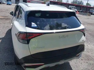 2023 Kia Sportage EX z VIN KNDPVCAG9P7095057, wystawiony jako IAAI lot #42016214 z przebiegiem 8 789 mil mil oraz . Historia ofert i sprzedaży dostępna na DreamBid. Obrazek 16.