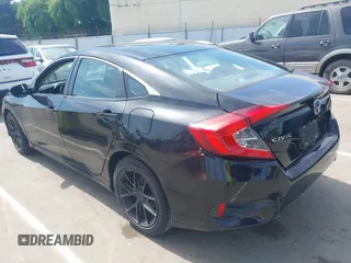 2019 Honda Civic Sedan LX with VIN 2HGFC2F61KH510012, listed as a IAAI auction lot 42073212 with 86,487 mi miles. Bid and sale history available at carsss.com. Image 3.