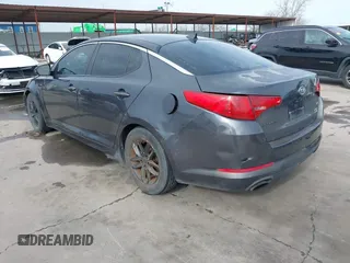 2011 Kia Optima LX with VIN KNAGM4A72B5057583, listed as a IAAI auction lot 41649320 with 207,898 mi miles and . Bid and sale history available at DreamBid. Image 3.