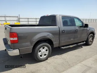 2004 Ford F-150 XLT with VIN 1FTRW12W74KC26169, listed as a Copart auction lot 68393914 with 118,059 mi miles and Salvage Title. Bid and sale history available at DreamBid. Image 3.