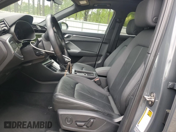 2019 Audi Q3 Premium z VIN WA1AECF32K1075590, wystawiony jako Copart lot #52745635 z przebiegiem 69 256 mil mil oraz Szkoda całkowita • Salvage title. Historia ofert i sprzedaży dostępna na DreamBid. Obrazek 7.