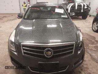 2014 Cadillac ATS Standard AWD z VIN 1G6AG5RX8E0174762, wystawiony jako IAAI lot #42323296 z przebiegiem 107 213 mil mil oraz . Historia ofert i sprzedaży dostępna na DreamBid. Obrazek 12.