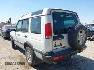 2000 Land Rover Discovery Cloth z VIN SALTY124XYA262828, wystawiony jako IAAI lot #41769729 z przebiegiem 215 711 mil mil oraz . Historia ofert i sprzedaży dostępna na DreamBid. Obrazek 3.