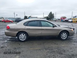 2006 Ford Taurus SE z VIN 1FAFP53U26A197294, wystawiony jako IAAI lot #41506334 z przebiegiem 180 411 mil mil oraz . Historia ofert i sprzedaży dostępna na DreamBid. Obrazek 13.