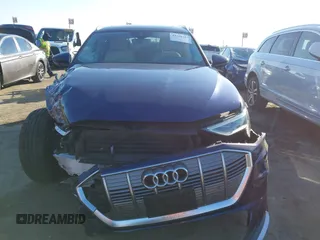 2021 Audi e-tron Premium with VIN WA1AAAGE4MB014383, listed as a IAAI auction lot 41298787 with 63,214 mi miles. Bid and sale history available at carsss.com. Image 13.