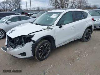 2016 Mazda CX-5 Grand Touring with VIN JM3KE2DY6G0674161, listed as a IAAI auction lot 41742139 with 118,536 mi miles. Bid and sale history available at carsss.com. Image 17.