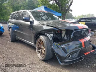 2014 Dodge Durango R/T z VIN 1C4SDJCT5EC503358, wystawiony jako IAAI lot #42491055 z przebiegiem 118 862 mil mil oraz . Historia ofert i sprzedaży dostępna na DreamBid. Obrazek 1.