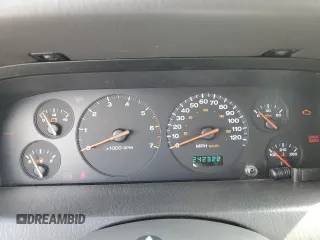 2000 Jeep Grand Cherokee Laredo with VIN 1J4GW48N1YC324356, listed as a Copart auction lot 62011305 with 242,322 mi miles and Salvage title. Bid and sale history available at DreamBid. Image 9.