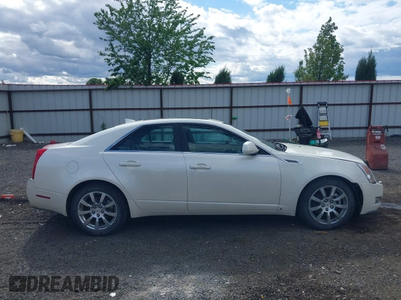 2009 Cadillac CTS AWD z VIN 1G6DT57V090104530, wystawiony jako IAAI lot #42314043 z przebiegiem 96 109 mil mil oraz . Historia ofert i sprzedaży dostępna na DreamBid. Obrazek 14.