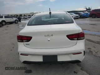 2023 Kia Rio S with VIN 3KPA24AD3PE573452, listed as a Copart auction lot 68249544 with 12,001 mi miles and Non Repairable. Bid and sale history available at DreamBid. Image 6.