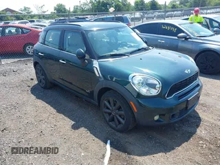 2011 MINI Countryman S with VIN WMWZC5C50BWM11401, listed as a IAAI auction lot 42694130 with 115,358 mi miles and . Bid and sale history available at DreamBid. Image 1.