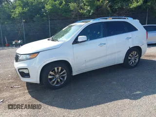 2012 Kia Sorento SX with VIN 5XYKWDA21CG253986, listed as a IAAI auction lot 42405849 with 218,540 mi miles and . Bid and sale history available at DreamBid. Image 2.