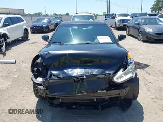 2016 Hyundai Veloster Turbo with VIN KMHTC6AE5GU281597, listed as a IAAI auction lot 42006038 with 77,642 mi miles. Bid and sale history available at carsss.com. Image 13.