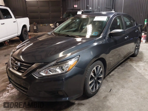 2018 Nissan Altima SR with VIN 1N4AL3AP9JC121415, listed as a IAAI auction lot 41528034 with 136,793 mi miles and . Bid and sale history available at carsss.com. Image 2.