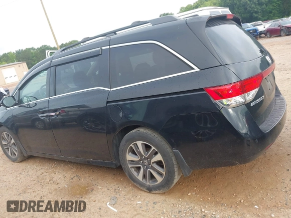 2015 Honda Odyssey Touring Elite with VIN 5FNRL5H90FB065004, listed as a IAAI auction lot 42461597 with 317,523 mi miles and . Bid and sale history available at DreamBid. Image 14.