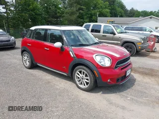 2015 MINI Countryman S with VIN WMWZC5C55FWP45882, listed as a IAAI auction lot 42412670 with 67,757 mi miles and . Bid and sale history available at DreamBid. Image 1.