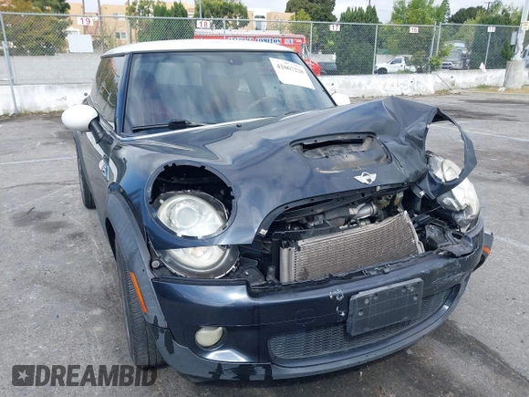 2007 MINI Hardtop S with VIN WMWMF73557TT80376, listed as a IAAI auction lot 42067228 with 174,262 mi miles and . Bid and sale history available at DreamBid. Image 1.