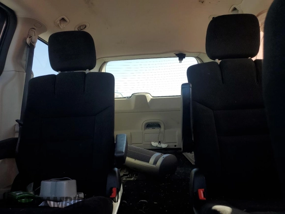 2015 Dodge Grand Caravan American Value with VIN 2C4RDGBG6FR603659, listed as a Copart auction lot 52385735 with 209,818 mi miles and Salvage Title. Bid and sale history available at DreamBid. Image 10.