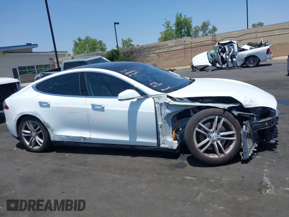 2014 Tesla Model S 60 с VIN 5YJSA1H17EFP40534, выставлен на аукционе IAAI как лот 42346697 с пробегом 203 166 миль миль и . История ставок и продаж доступна на DreamBid. Изображение 14.