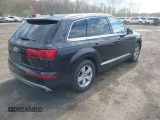 2019 Audi Q7 Premium with VIN WA1AHAF74KD034469, listed as a IAAI auction lot 42037259 with 92,404 mi miles and . Bid and sale history available at DreamBid. Image 4.