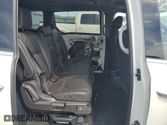 2019 Honda Odyssey Touring z VIN 5FNRL6H80KB501681, wystawiony jako Copart lot #58814945 z przebiegiem 105 287 mil mil oraz Szkoda całkowita • Salvage title. Historia ofert i sprzedaży dostępna na DreamBid. Obrazek 11.