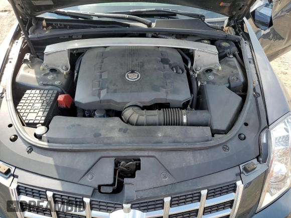 2013 Cadillac CTS Premium с VIN 1G6DP5E34D0151591, выставлен на аукционе Copart как лот 63668325 с пробегом 59 477 миль миль и Списание • Salvage title. История ставок и продаж доступна на DreamBid. Изображение 11.