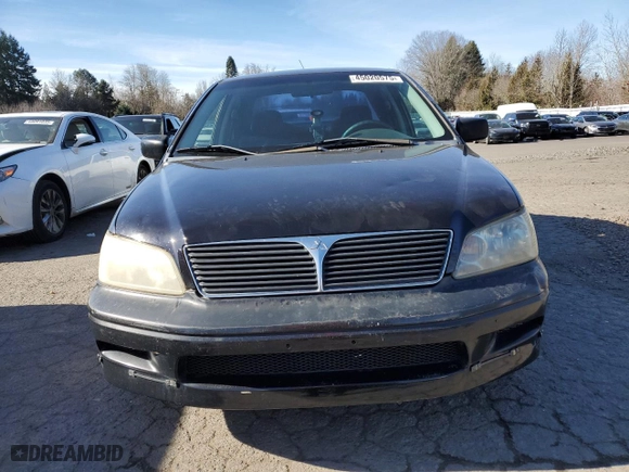 2002 Mitsubishi Lancer OZ-Rally with VIN JA3AJ86E92U027551, listed as a Copart auction lot 45020575 with 214,575 mi miles and Salvage Title. Bid and sale history available at carsss.com. Image 5.