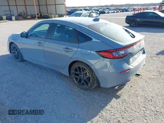 2022 Honda Civic Sport Touring z VIN 19XFL1G89NE009751, wystawiony jako IAAI lot #41845803 z przebiegiem Nie podano mil oraz . Historia ofert i sprzedaży dostępna na DreamBid. Obrazek 3.