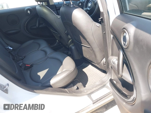 2014 MINI Countryman S z VIN WMWZC5C52EWP39083, wystawiony jako IAAI lot #42409957 z przebiegiem 73 497 mil mil oraz . Historia ofert i sprzedaży dostępna na DreamBid. Obrazek 8.