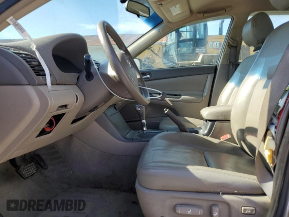2006 Toyota Camry STD z VIN 4T1BE30K46U108275, wystawiony jako Copart lot #59905115 z przebiegiem 157 072 mil mil oraz Szkoda całkowita • Salvage title. Historia ofert i sprzedaży dostępna na DreamBid. Obrazek 7.